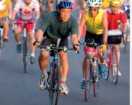 riding a bicycle with a helmet